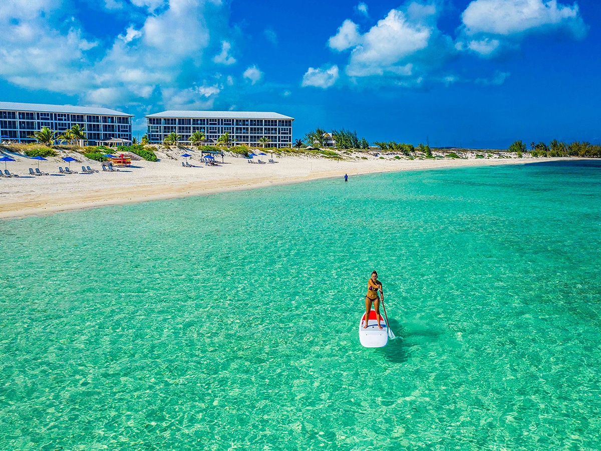 a paddleboarder at the resort